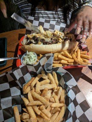 Sour cream and onion seasoned fries and a cheese steak