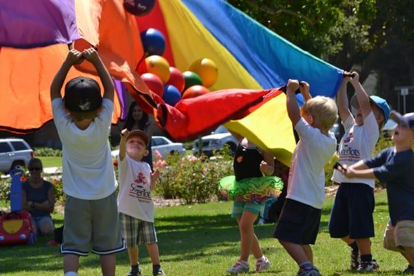 You're never too old to play with a parachute!