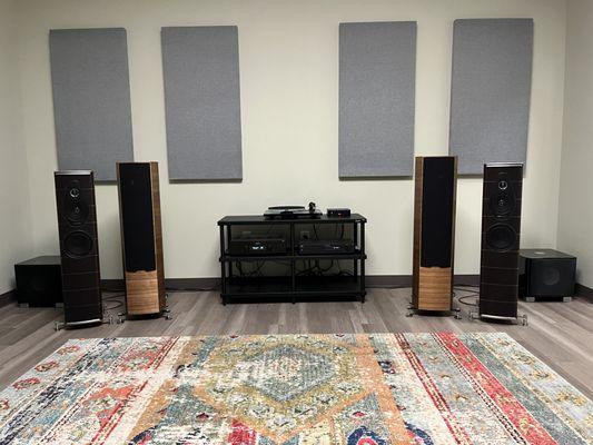 Sonus Faber Sonetto and Olympica Nova speakers with REL subwoofers. Hegel amplifier, Rega turntable, NAD CD player and Solidsteel stand