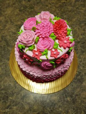 HEB designers knocked it out of the park! Under $70. The cake was moist, delicious (not the hot pink icing), and beautiful.