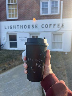 Oat milk Latte in front of the store