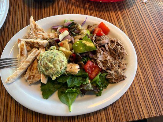 Paleo Plate. I don't think that chicken was grilled in house.