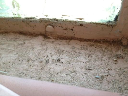 Dirty window sill.