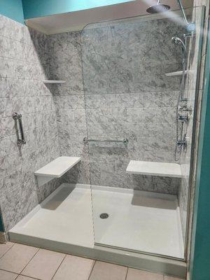 Completed walk in shower installation.  We LOVE the new shower.