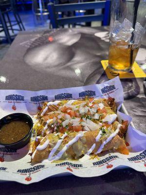 Taquitos with all the fixings. Not too spicy. Just right.