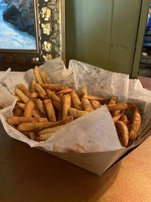 Fries. You get a pound if you order a side. Recommend getting these & a cocktail while you wait on your to-go order.