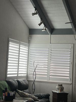 Front living room Plantation Shutters , really came out great and really changed the appearance of my house inside and out .