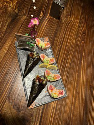 Eel hand roll and pink lady roll