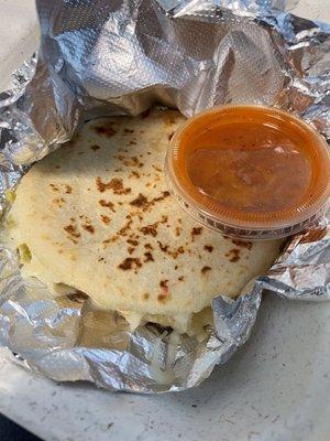 Potato, cheese and green Chile Gordita with hot salsa...the salsa is a must