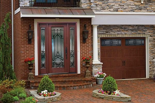 Garage doors and entry doors beautifully complement each other.