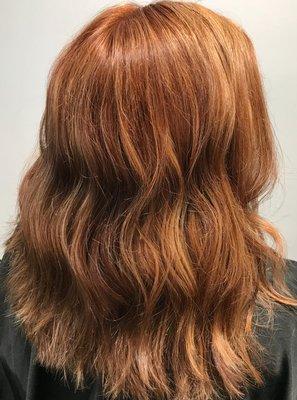 Balyage and root retouch and glaze with a layered cut.