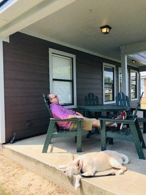 Chilling on the covered patio looking over the water. So relaxing at these cabins. Our favorite place and my dog loves it!