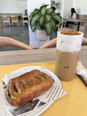 Spinach pastry & Biscoffee Latte with oat milk.