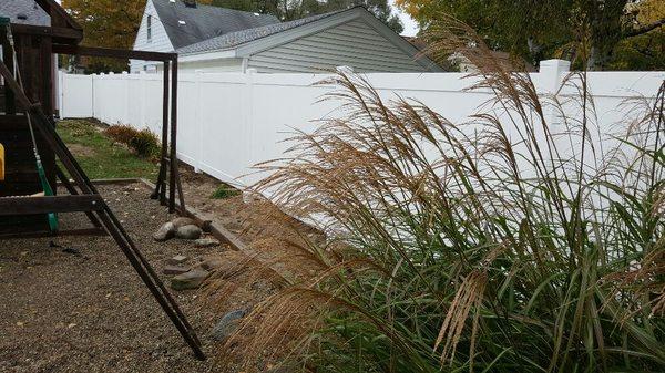 White vinyl fence