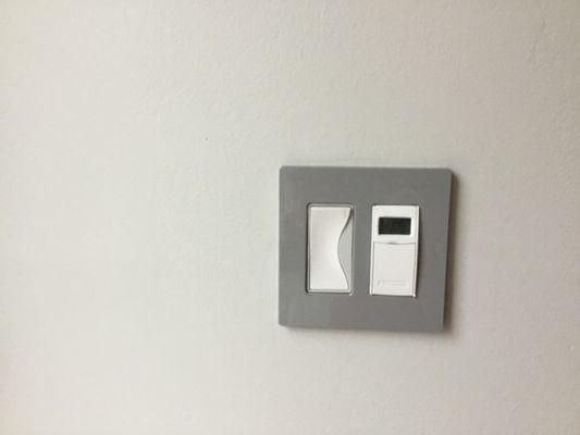 Designer wall switch w/ screwless wall plate I supplied & installed w/ timer  w/ daylight savings time