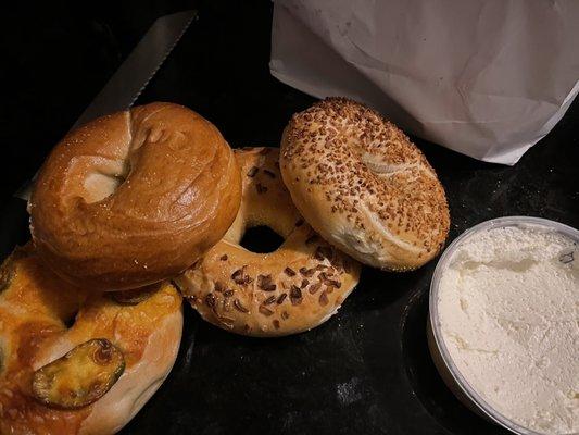 Jalapeño Chedder, plain, onion and garlic bagels with cream cheese