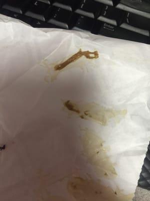 These are the chunks of what appears to be napkin that I pulled out of my macchiato...AGAIN, WTF.  DISGUSTING.