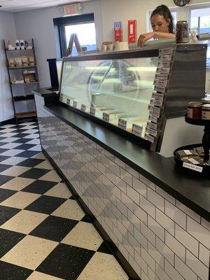 Inside counter with ice cream and flavors