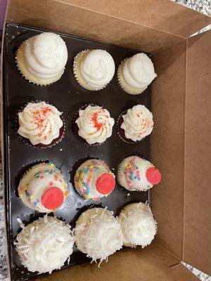 Flavors are wedding, red velvet, birthday surprise and coconut mini cupcakes -- yummy!