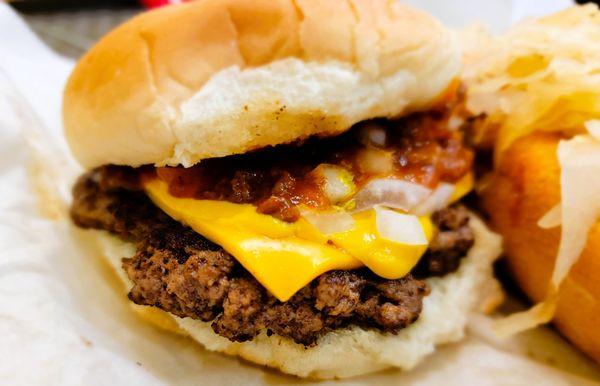 Chili Cheeseburger with onions and mustard