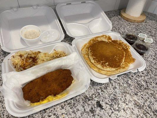 Country fried steak with eggs, hash browns, and pancakes, delicious!