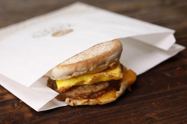 Breakfast sandwich offered in sausage and/or bacon!