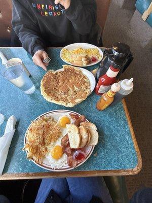 banana nut pancake, meat & potatoes omelette, two eggs + meat + potatoes