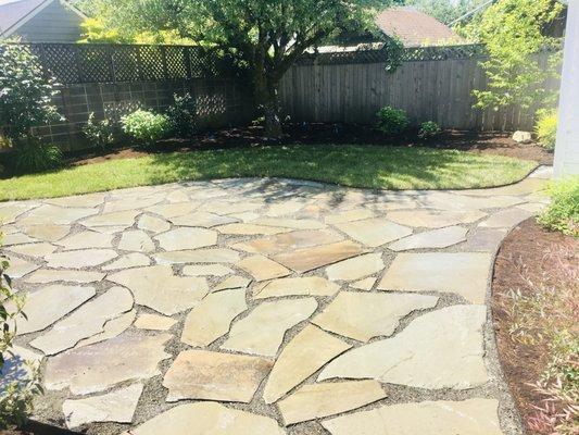 Flagstone patio, sod install, and irrigation system in NE.