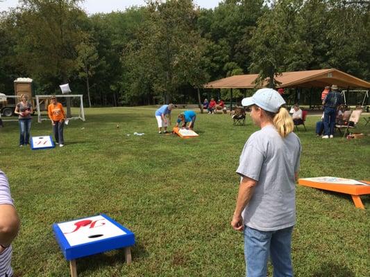 Camper's Fair cornhole game at Piney.