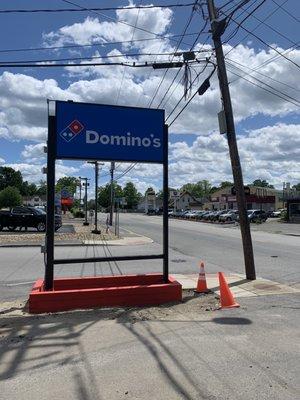 New Dominos sign. Next to Car Wash