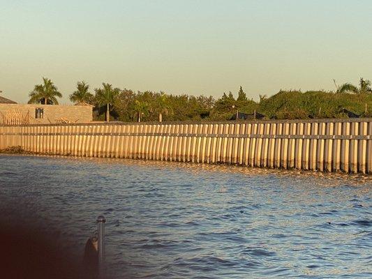 The sea wall Medallion Homes will build you a on these decaying lots