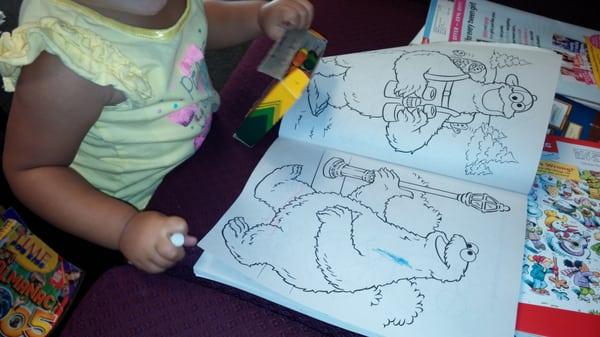 They have coloring books and crayons.