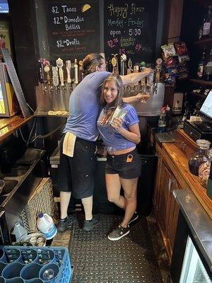 Victoria and Brett slinging beers