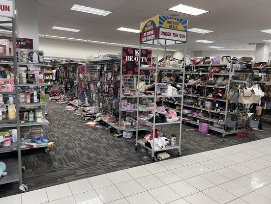 Cosmetics? Women's shoes, hard to tell when they are on the floor.