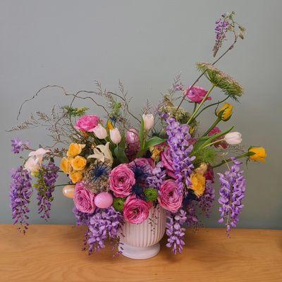 Wisteria and garden roses