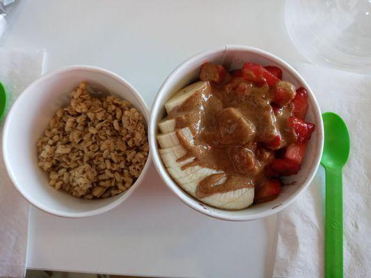 Pre-built Protein Acai Bowl with Almond Butter, Granola on the side.