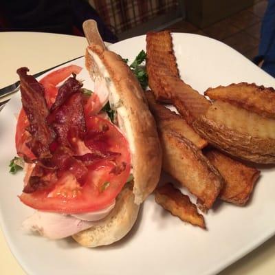 Turkey club with steak fries