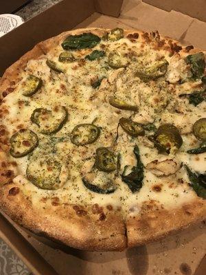 Chicken Alfredo Pizza with jalapeños. Very good!