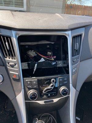 sloppily installed head unit, no dash kit, no support.