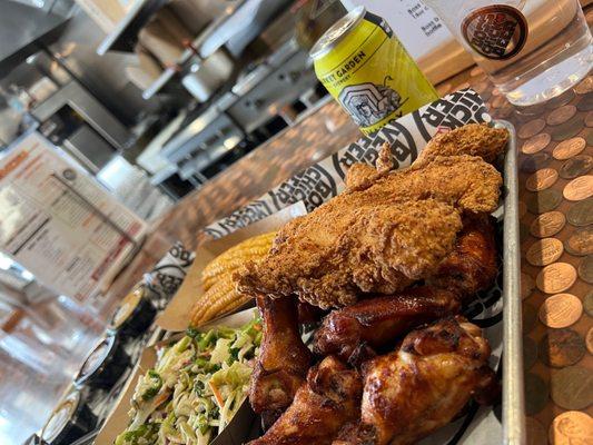 Tenders, wings, corn ribs and slaw.