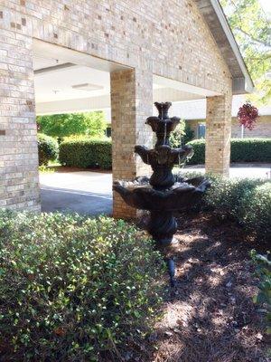 The front entrance has a beautiful fountain to enjoy