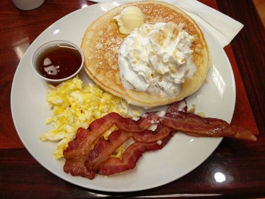 American breakfast, with pancakes, eggs and bacon. Very filling, homemade to order, and tasted great!