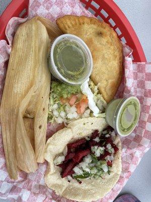 1 beef empanada, 1 Al pastor taco, 1 cheese and jalapeño tamale