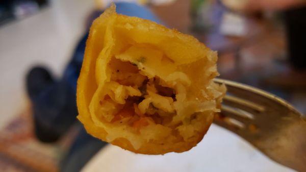 Interior of fried veggie spring roll ($5.25). Weird, off-putting cream cheese-flavored filling.