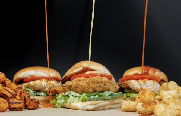 Indulge in our irresistible chicken sandwiches, perfectly paired with a side of crispy tater tots or sweet potato tots!