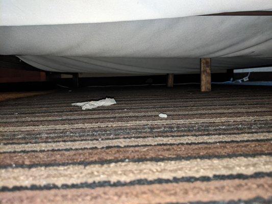 Tissue under the bed, socks under another