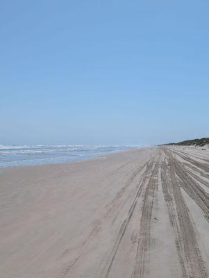 The extremely high tide at 2 am is going all the way to the dunes. You can see the wet sand left behind I'm navigating