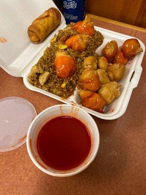 Sweet and sour dinner plate with included egg roll.