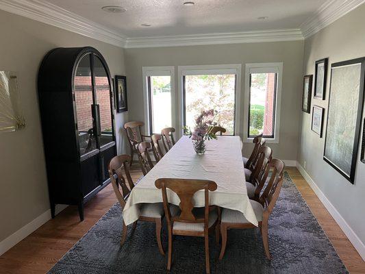 Dining room incorporated into the 'great room' with double arches replacing solid walls to keep the load bearing wall in place.