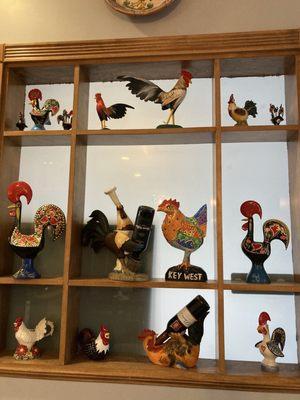 More indoor decor featuring rooster (galito) ceramic figurines.